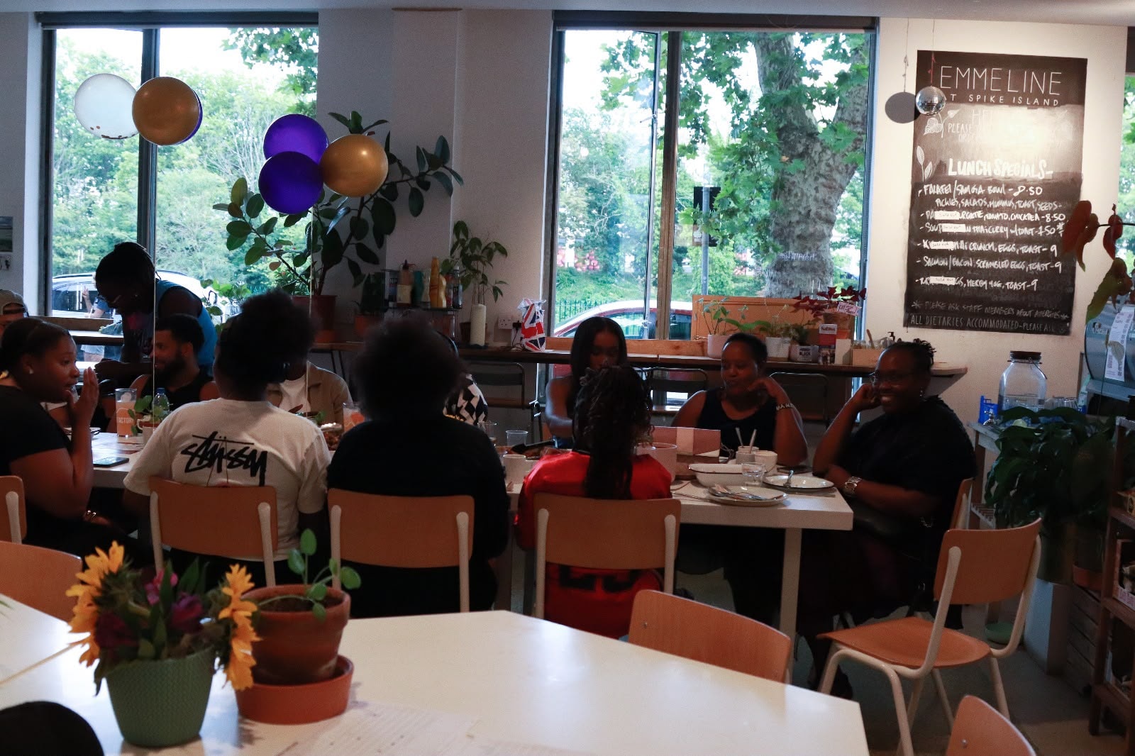 Wide view of the Emmeline Café full of guests at the EKing Foundation event