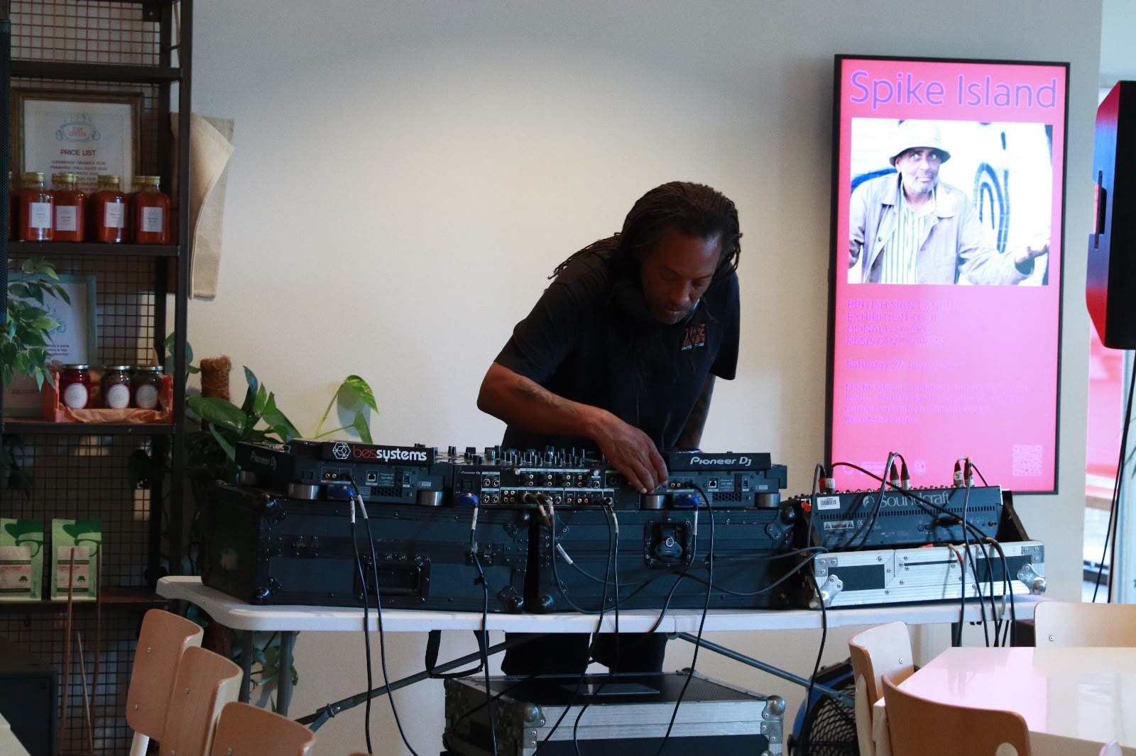 DJ setting up at the EKing Foundation event at Emmeline Café