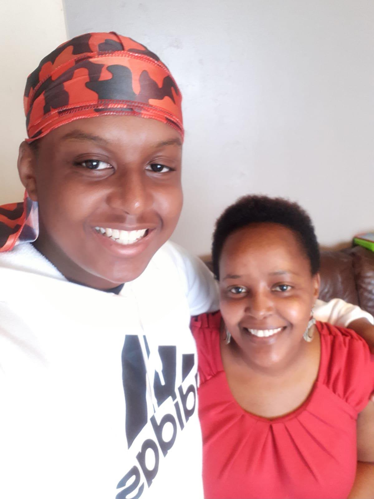 Eddie smiling with his mum